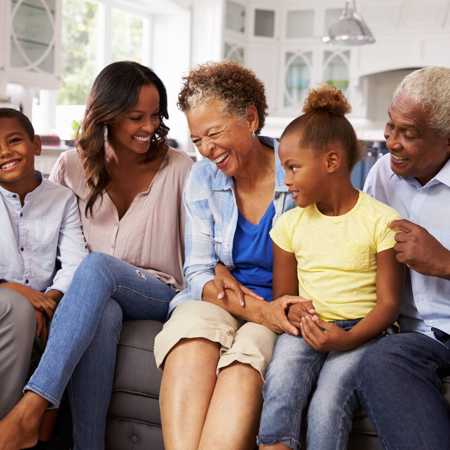 Family photo to accompany Kinnect Multi generation black family at home
