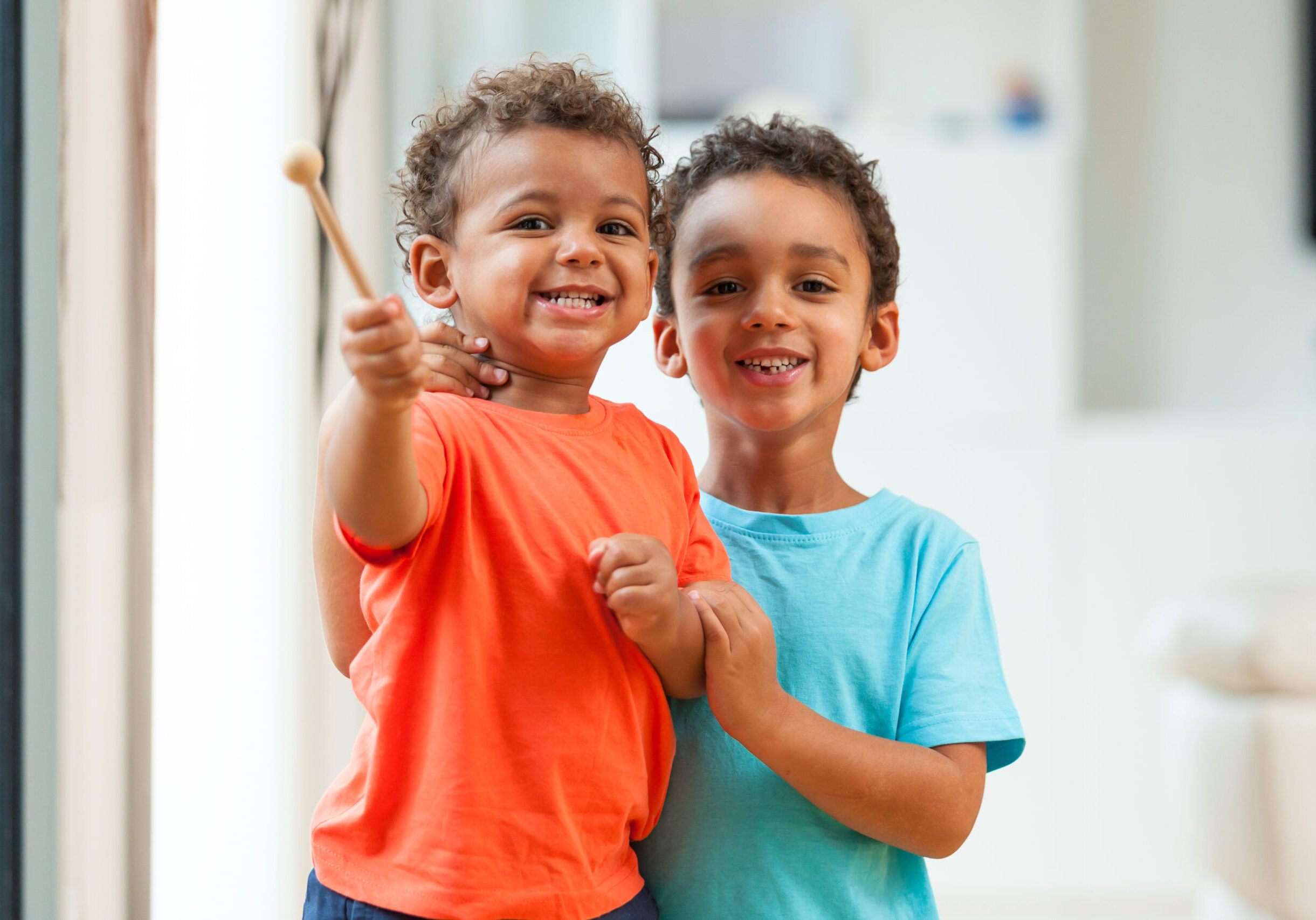 African american brothers child playing together